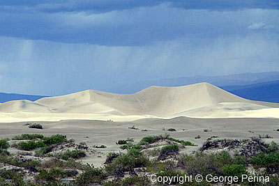Storm Clouds Over Mojave Dunes